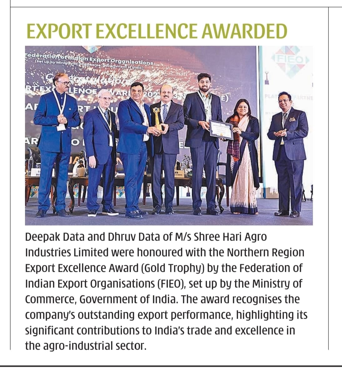 Deepak Data and Dhruv Data of Shree Hari Agro Industries Limited receiving the Northern Region Export Excellence Award, Gold Trophy, from the Federation of Indian Export Organisations.
